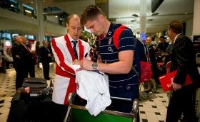 Owen Farrell took the time to sign an autograph as the England players were welcomed to Australia