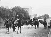 Photograph of horsemen including black trackers