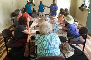 Sonya and other members of the community share a traditional Jirrbal story to inspire and inform the painting to follow.