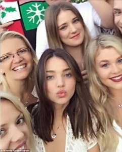 Spot the model: Miranda went on to share a group snap of herself and family members captioned, 'Family fun'