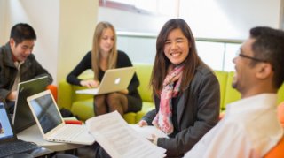 Students chatting in lounge area